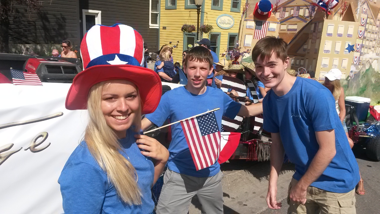 men-woman-US-flag-festival