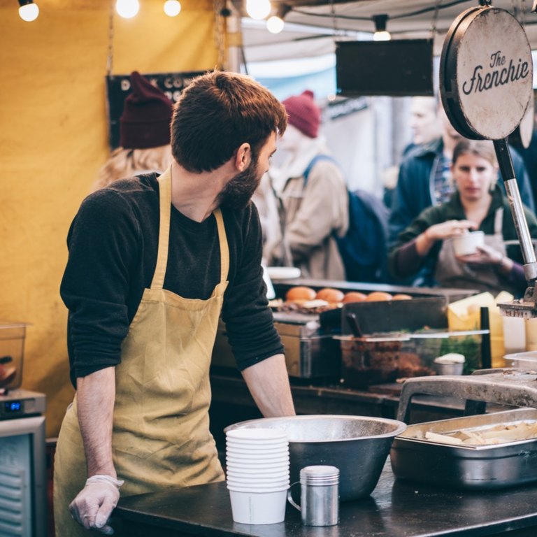 man-working-street-food