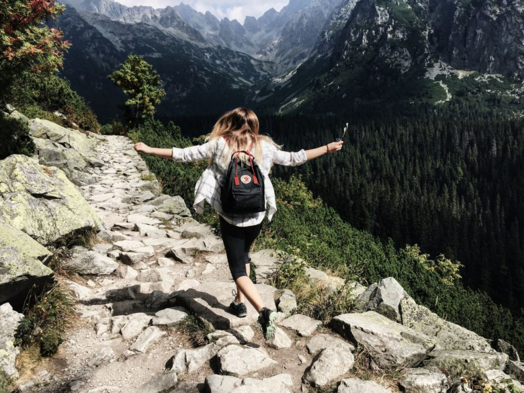mountain-woman-cheerful