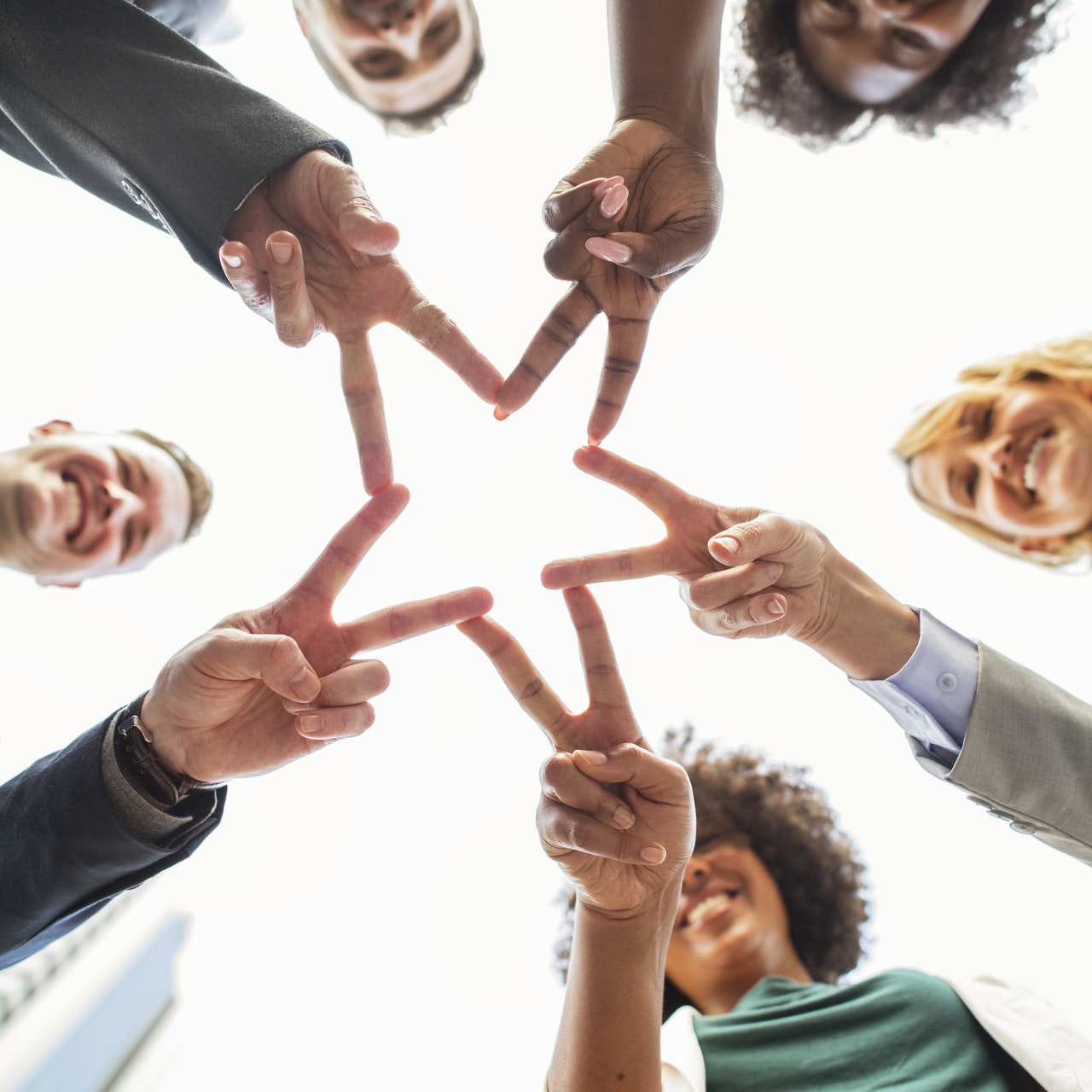 diversity people Diversity people making a star together with their fingers